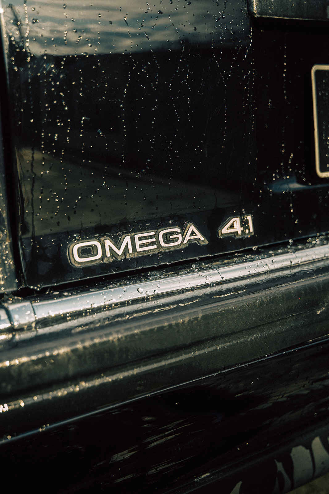 Emblema Omega CD 4.1 Retornar